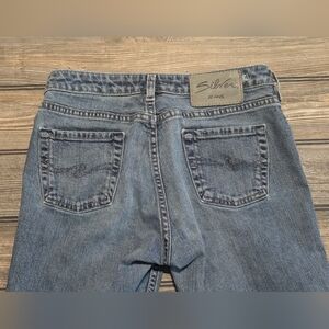 Silver Flares With Accent Seam Down The Front Legs Size 28/33